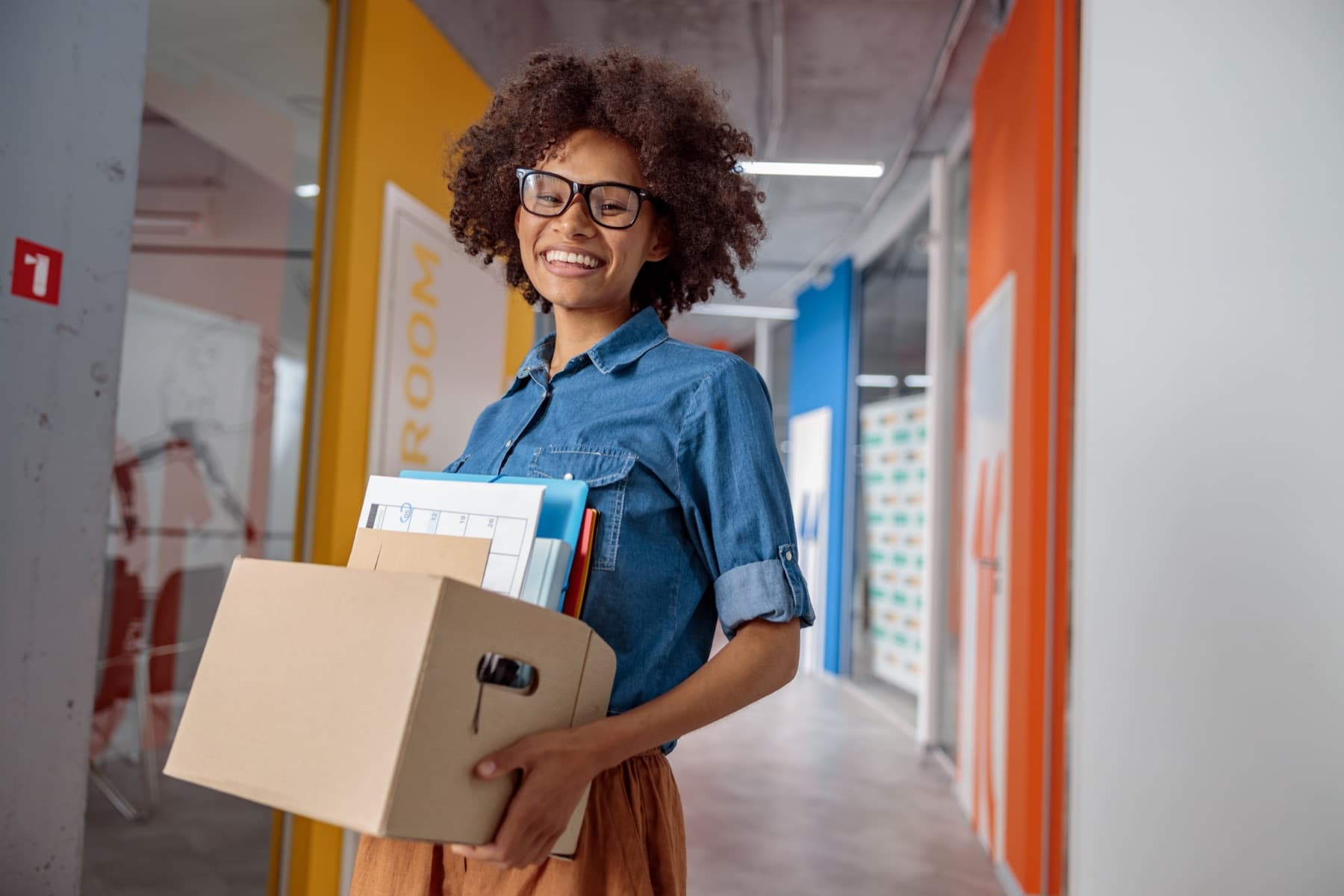 Professional reviewing relocation details with an employee